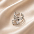 Bague Argentée Multi-Charms Trèfle – Ajustable